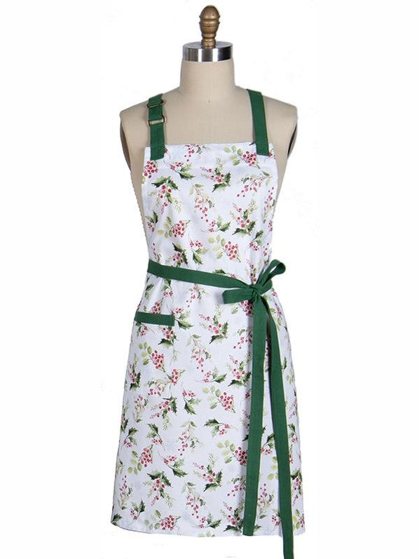 Floral apron with green straps on a mannequin against a white background