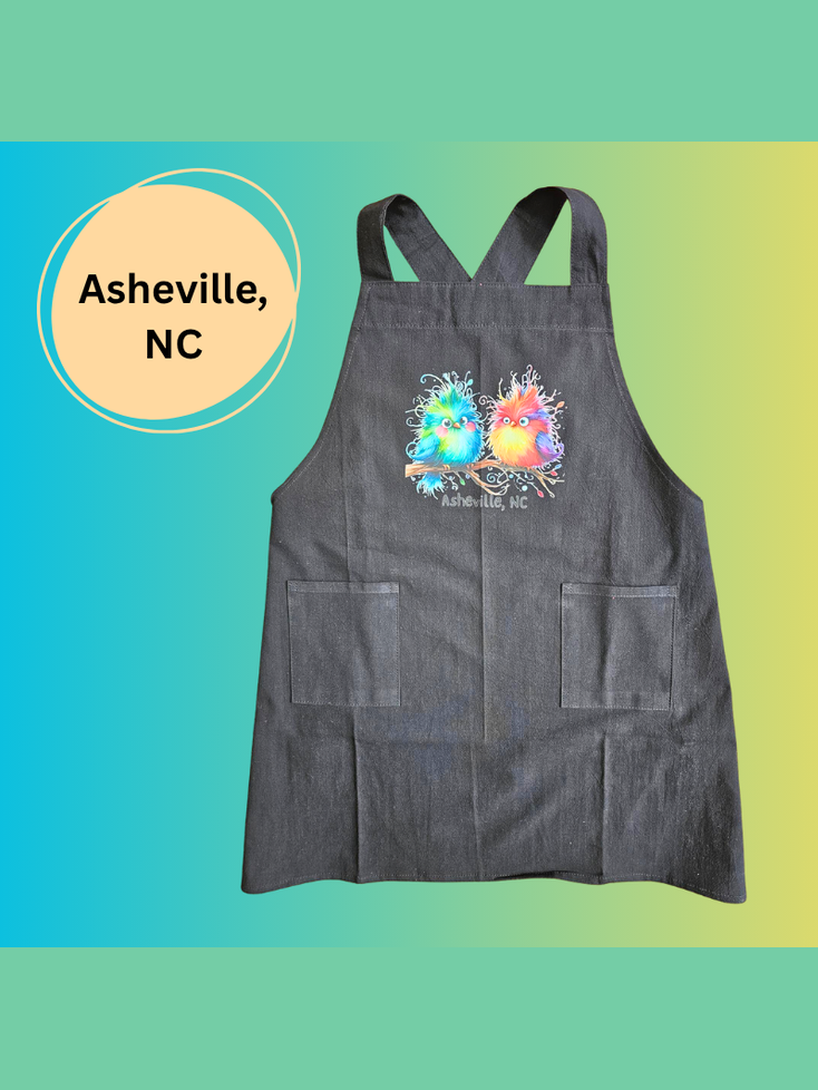 Child's Apron Black Cotton Cross Back Cute Birds Asheville, NC logo