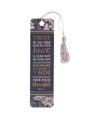A navy and ivory bookmark with a floral pattern and gold foil lettering, featuring a light grey tassel and the text 'TRUST IN THE LORD WITH ALL YOUR HEART AND LEAN NOT UPON YOUR OWN UNDERSTANDING; IN ALL YOUR WAYS SUBMIT TO HIM, AND HE WILL MAKE YOUR PATHS STRAIGHT' from Proverbs 3:5-6.