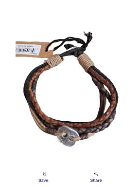 Bracelet with a tag on a marble surface