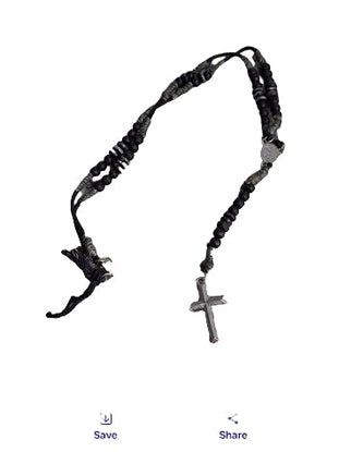 Necklace on a granite surface with 'A Jan' branding visible