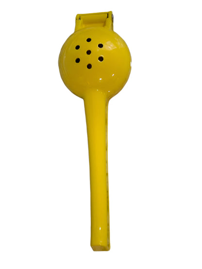 Yellow kitchen tool on a speckled countertop