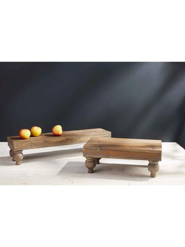 Our Long Wood Pedestal Stand is brand new for Spring! The long wood stand features pedestal feet. This board can be used for so many different things! We love to add picture frames and florals to this stand, but we also love this as a serving piece. Add sweet treats to it for the perfect dessert station.