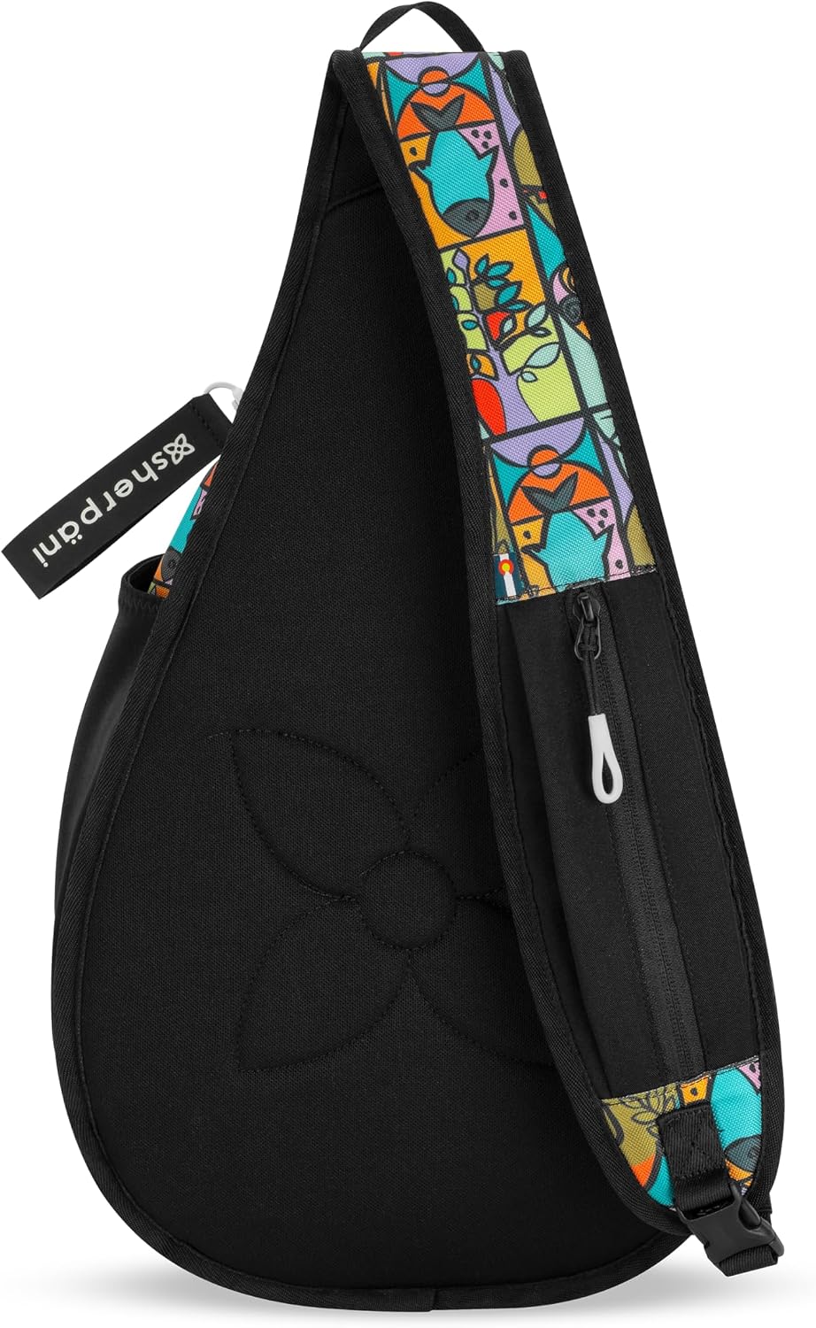 A black sling backpack with a colorful geometric patterned strap, featuring a side zipper and a black fabric tag that reads 'snooper'.