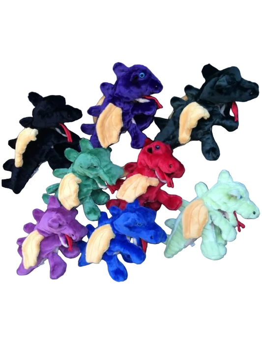 A group of plush dragon toys in multiple colors including purple, black, green, red, blue, and mint green, arranged on a black grid background.