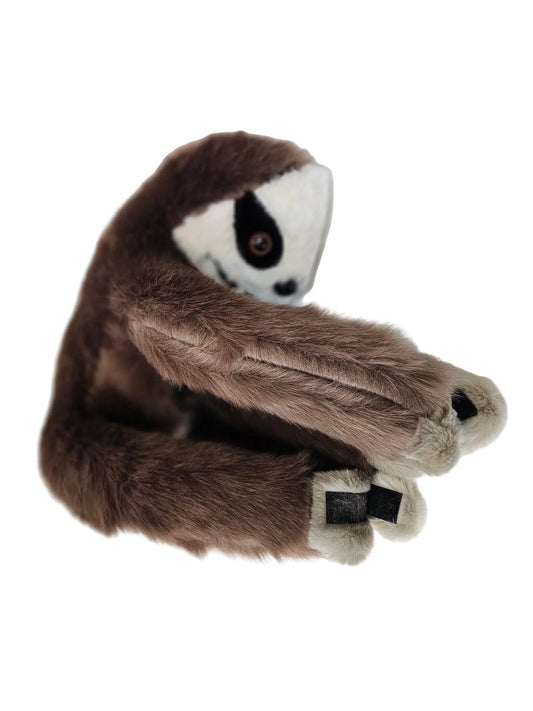 A plush sloth toy with brown faux fur body and arms, a white face, and black eye patch details, photographed on a white surface against a white paneled background.