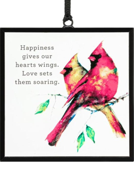 Decorative plaque with two cardinals and a motivational quote on a white background